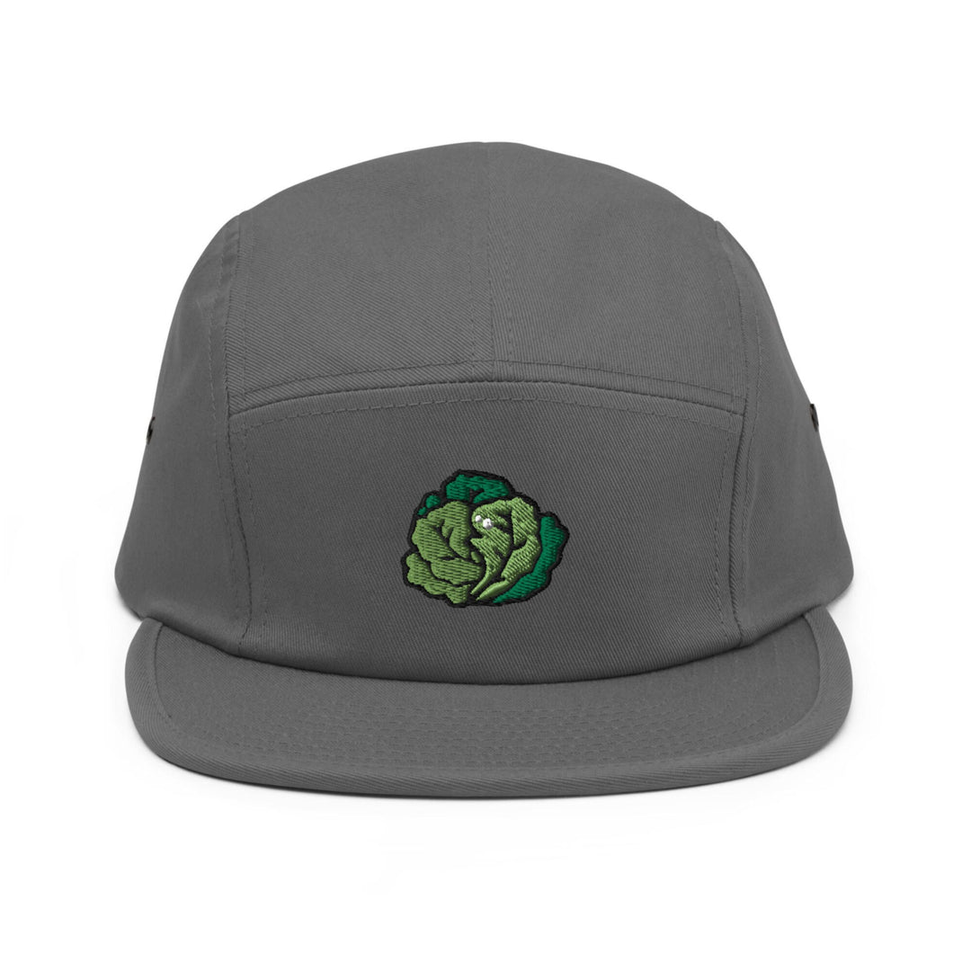 a gray hat with a green cabbage embroidered on it