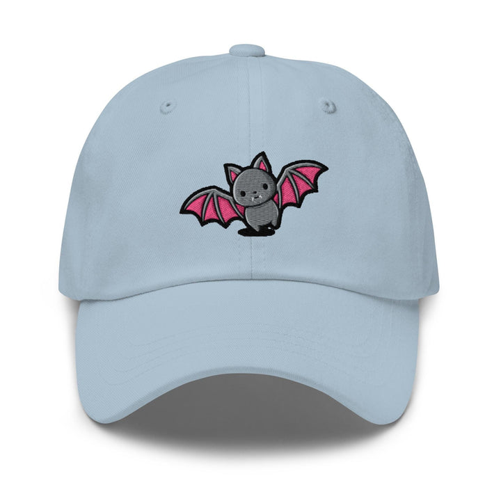 a light blue hat with a bat embroidered on it