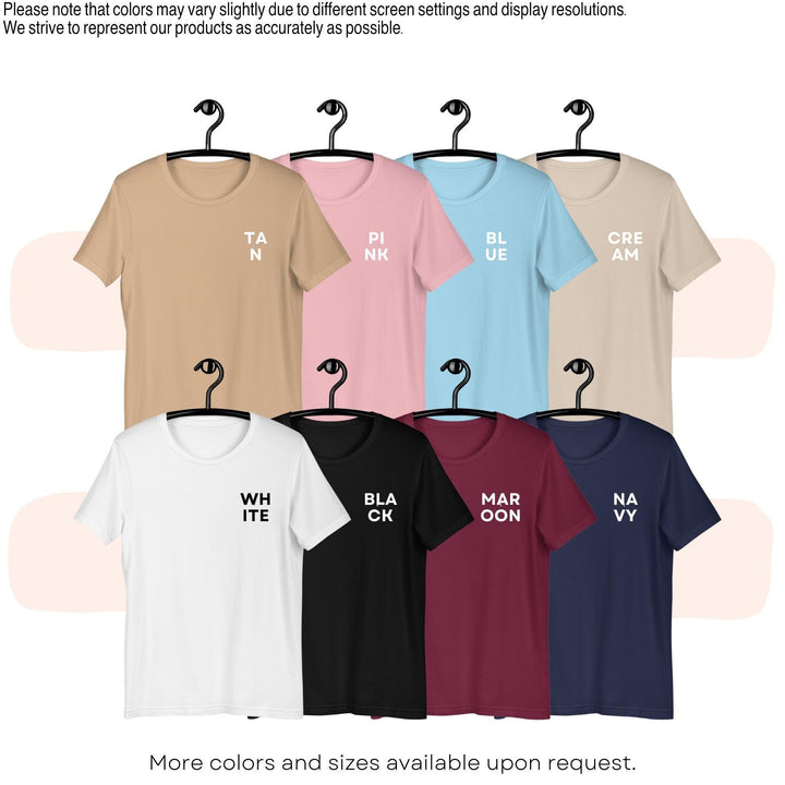 a group of t - shirts hanging on a rack