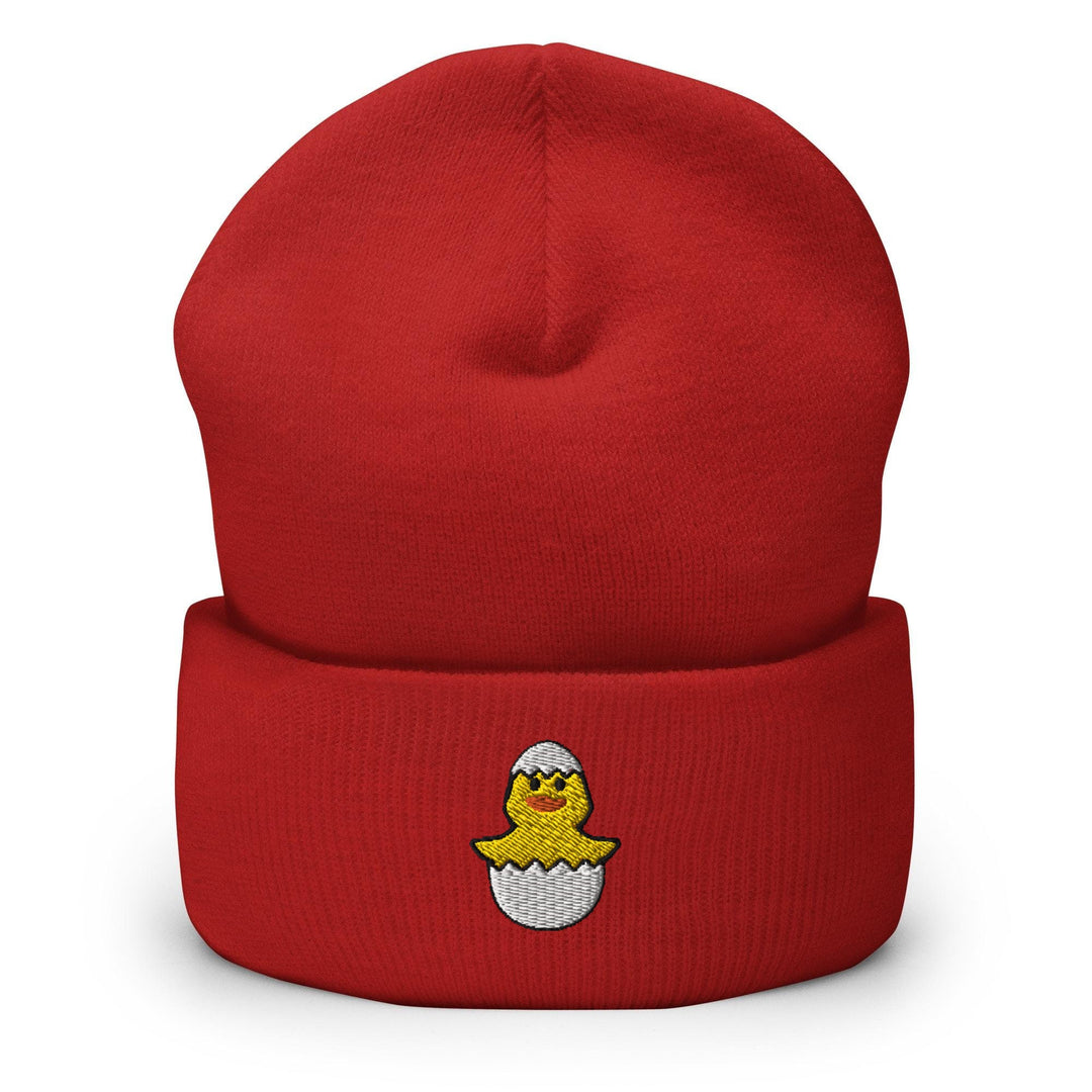 a red beanie with a yellow star on it