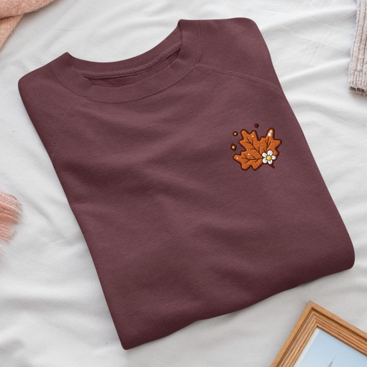 a t - shirt with a picture of a flower on it