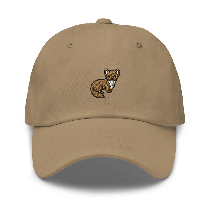 a tan cap with a brown bear embroidered on it