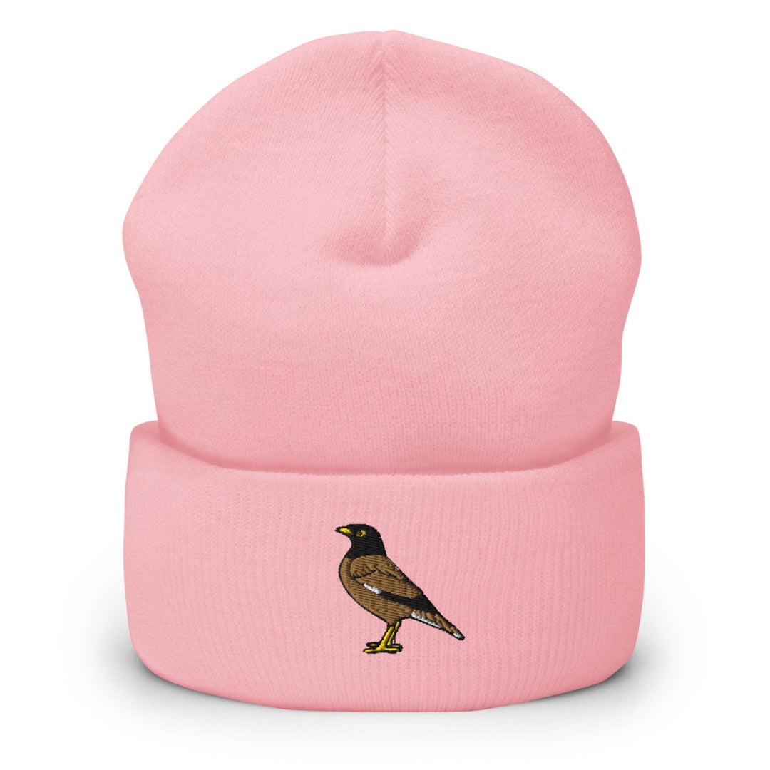 a pink hat with a bird on it