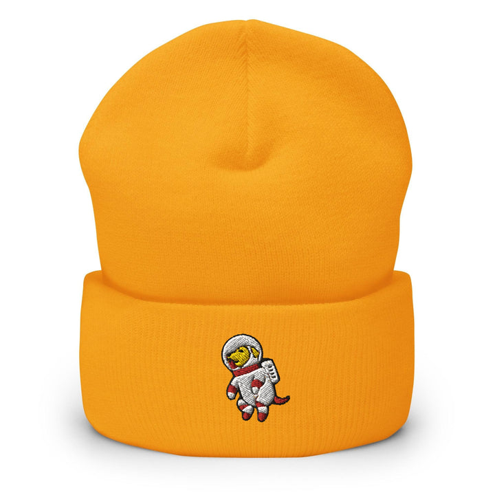 a yellow beanie with an astronaut on it