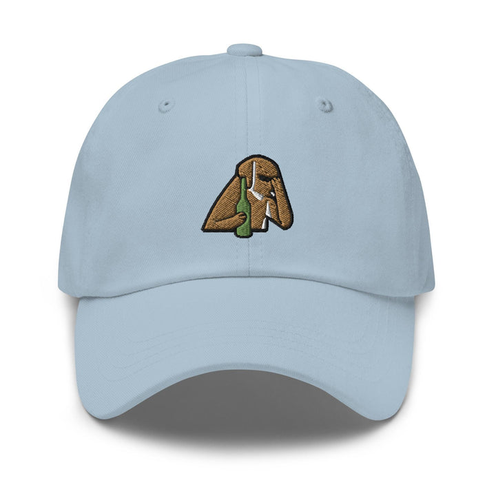 a light blue hat with a picture of a dog holding a bottle of beer