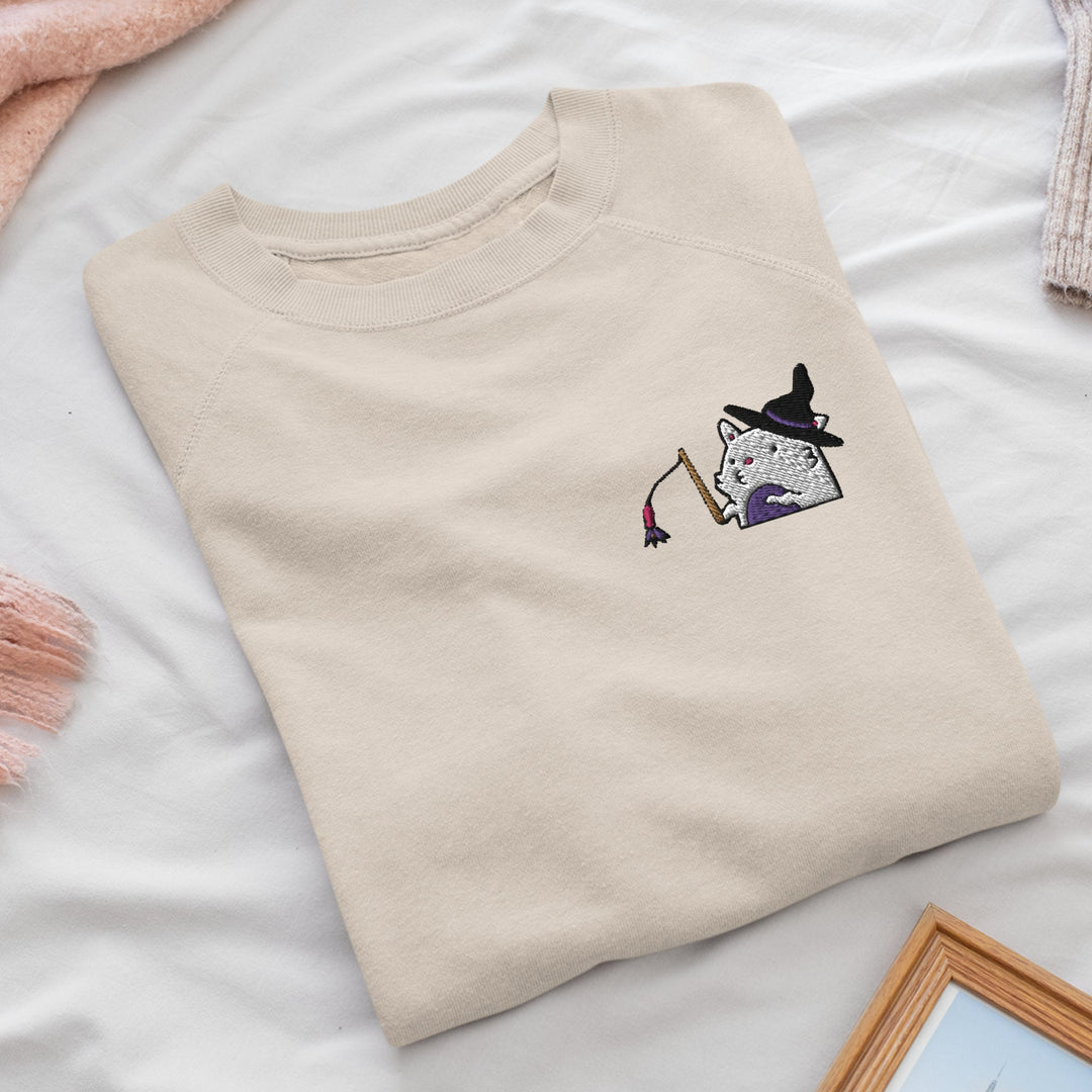 a t - shirt with a picture of a witch on it
