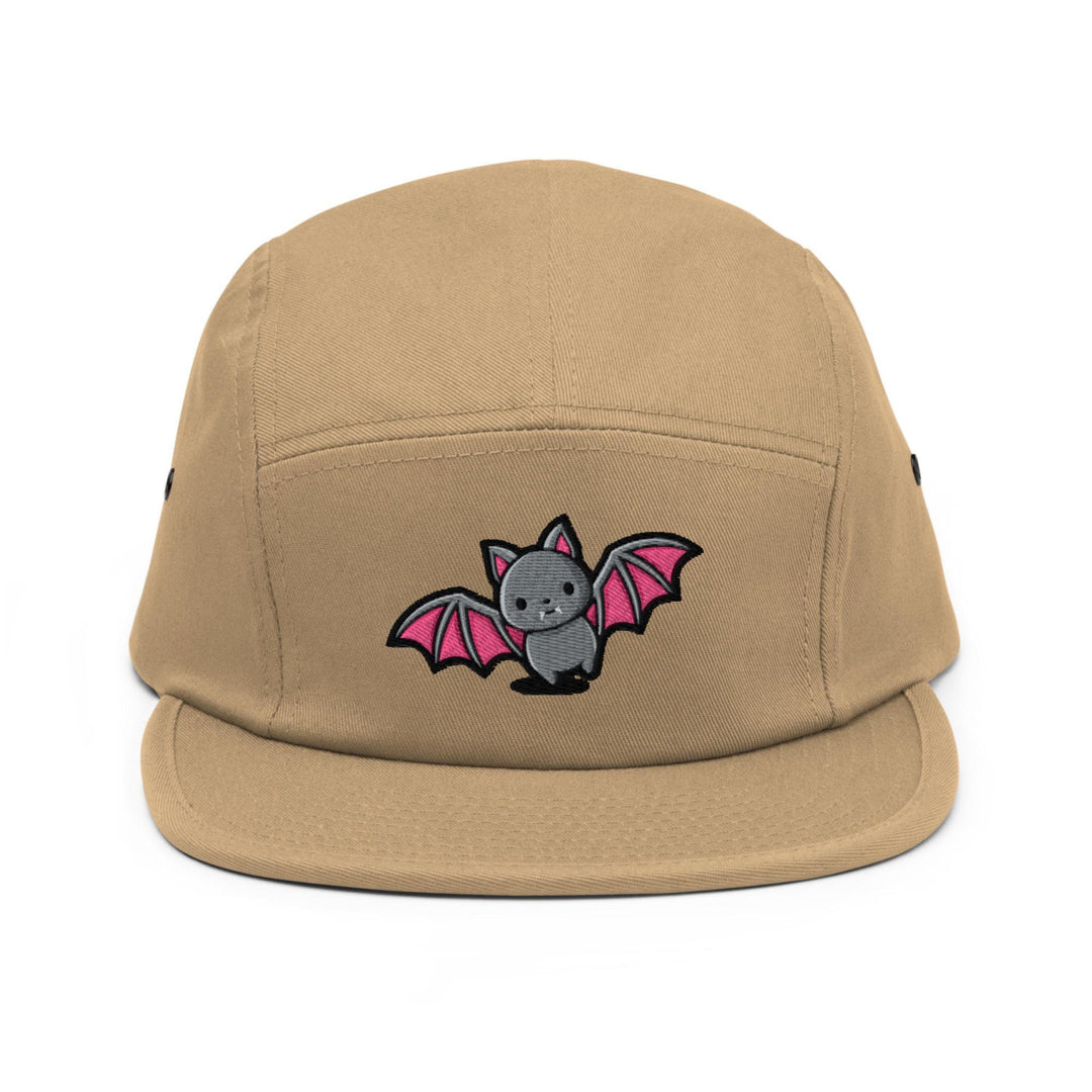 a brown hat with a bat embroidered on it