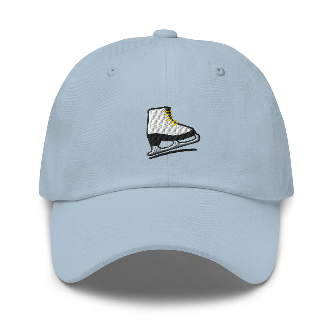 a light blue hat with a pair of ice skates embroidered on the front