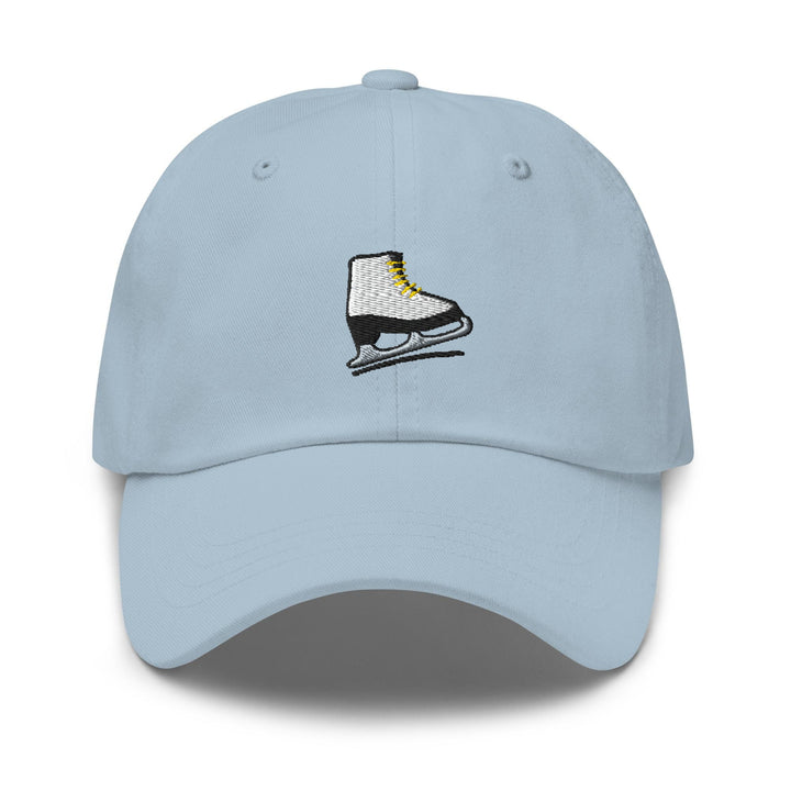 a light blue hat with a pair of ice skates embroidered on the front