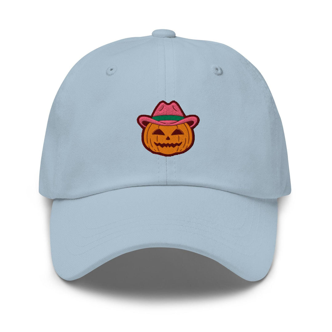 a light blue hat with a pumpkin wearing a hat