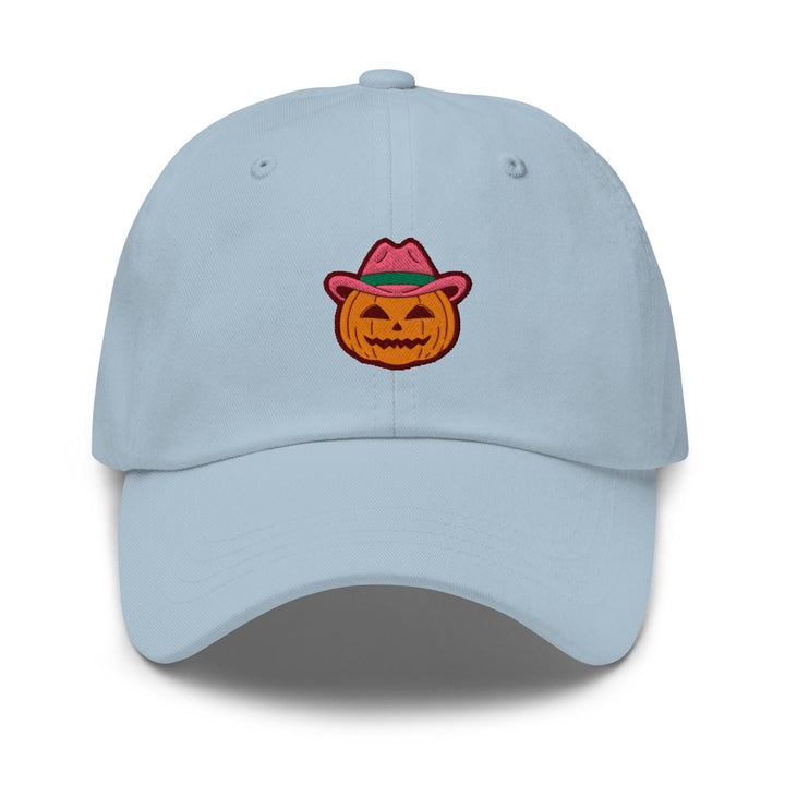 a light blue hat with a pumpkin wearing a hat