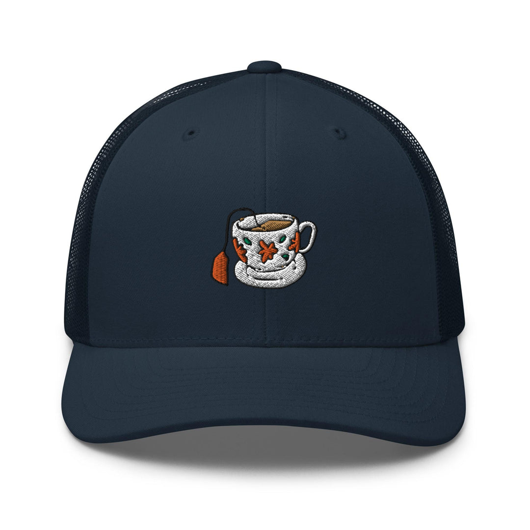 a blue hat with a picture of a coffee cup