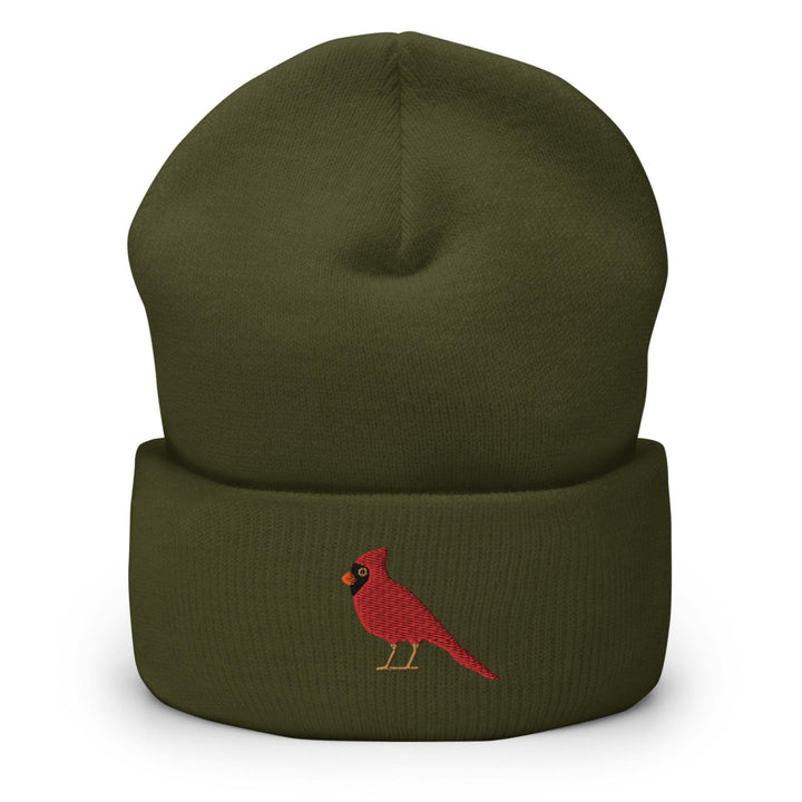 a green beanie with a red cardinal embroidered on it