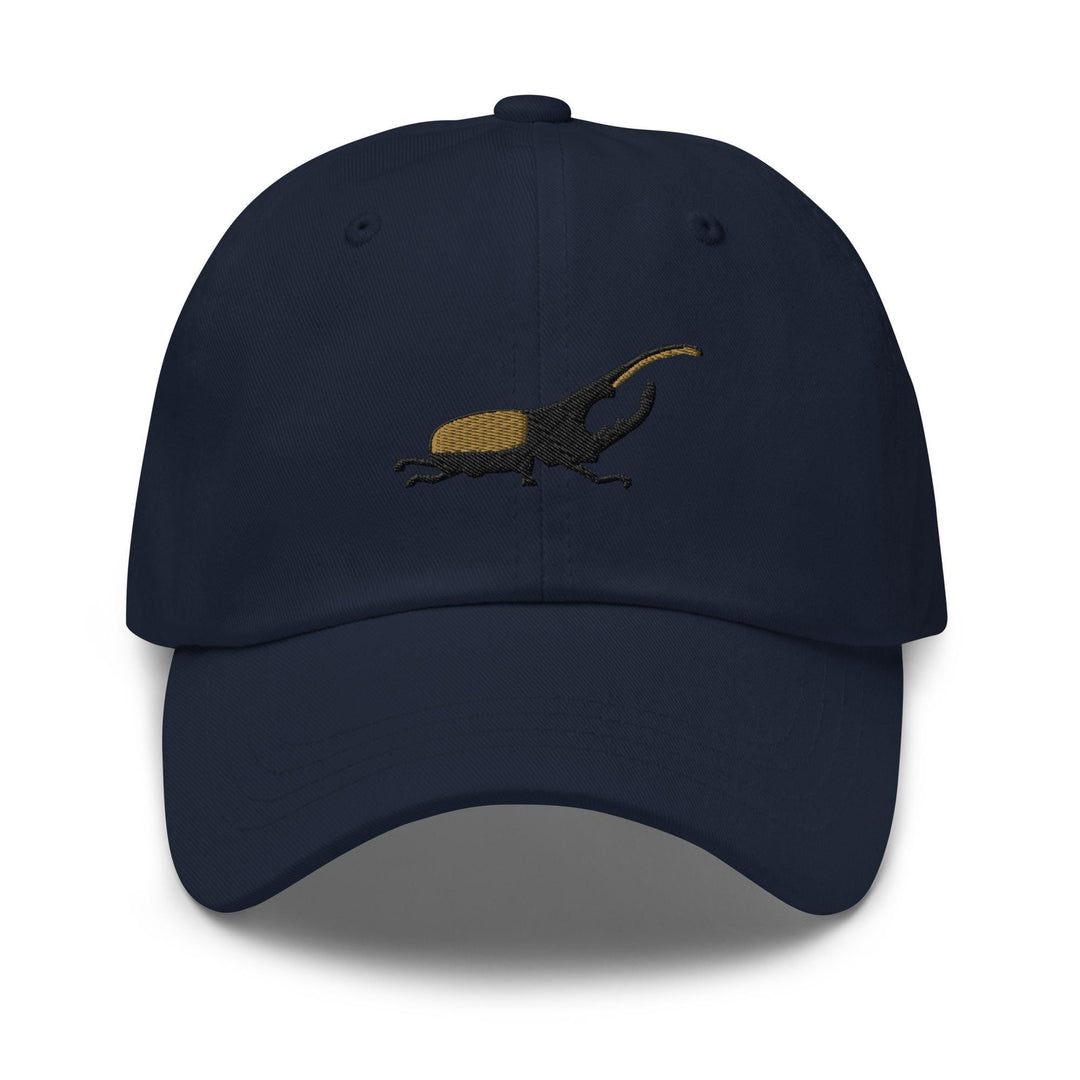 a blue hat with an image of a bug on it
