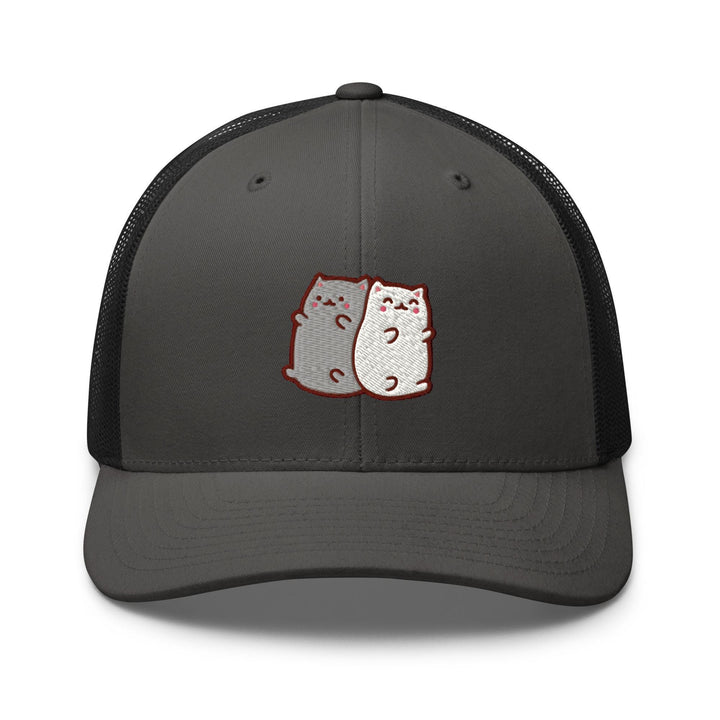 a gray and black trucker hat with two cats on it
