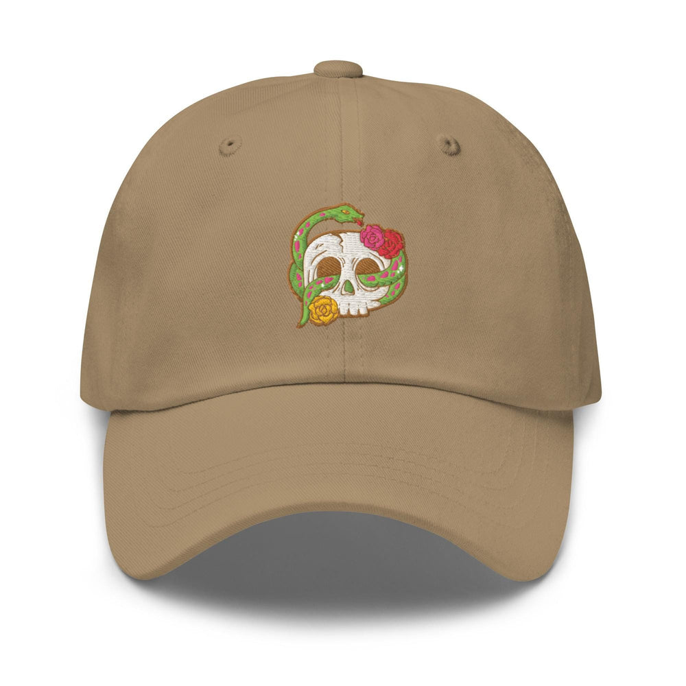 a tan hat with a skull and flowers on it