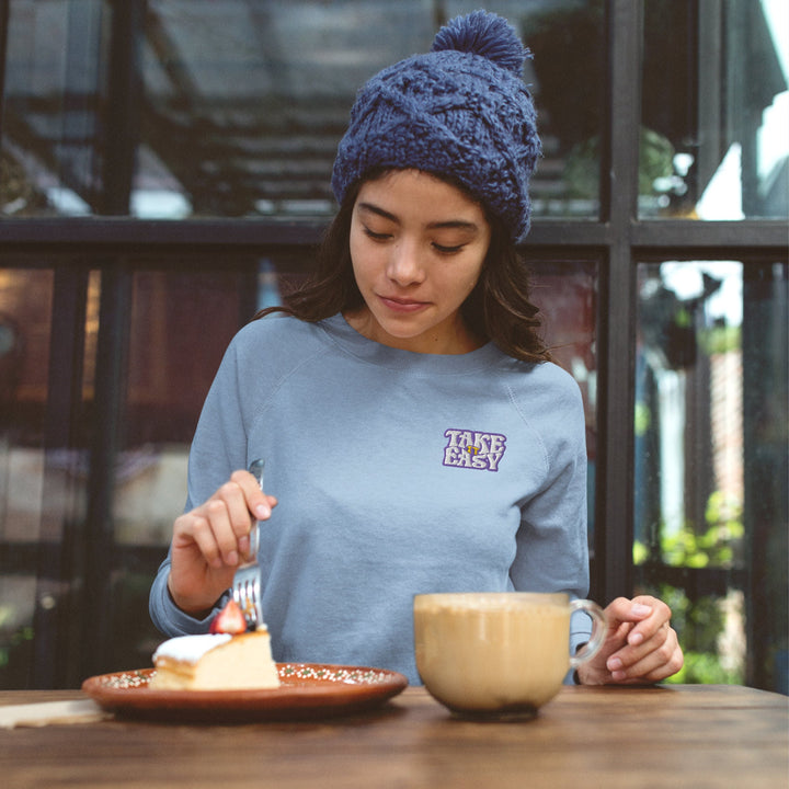 a blue hoodie with a picture of a dog on it
