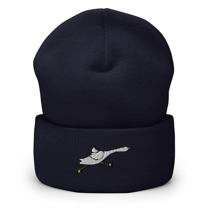 a black beanie with a white bird on it