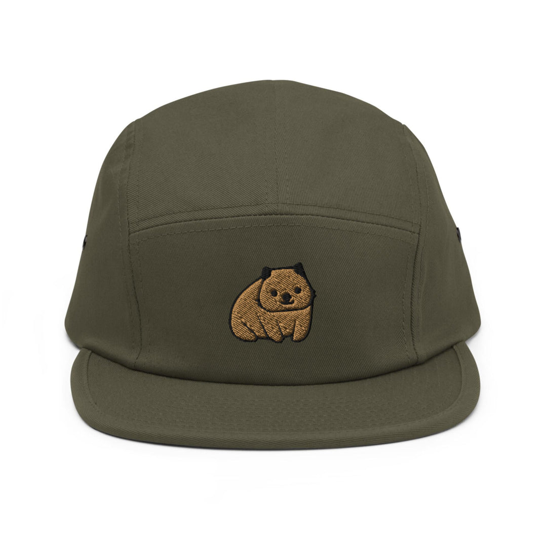 a green hat with a brown bear embroidered on it
