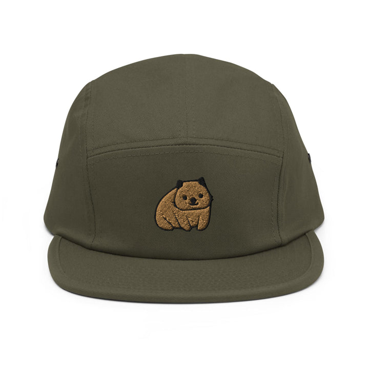 a green hat with a brown bear embroidered on it