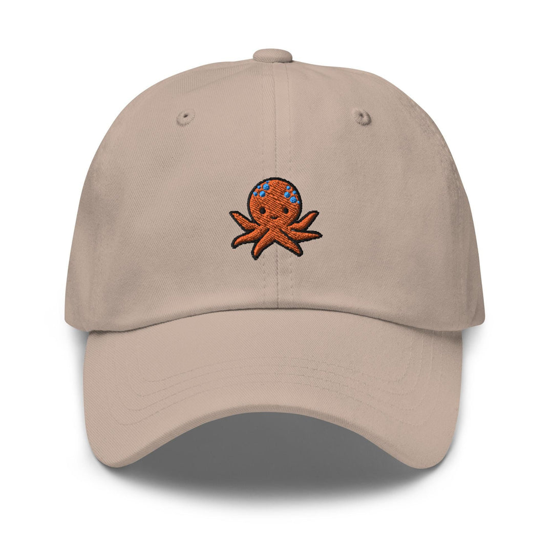a tan hat with an octopus on it