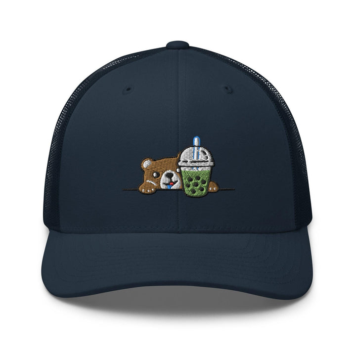 a blue trucker hat with a teddy bear hugging a cup of coffee