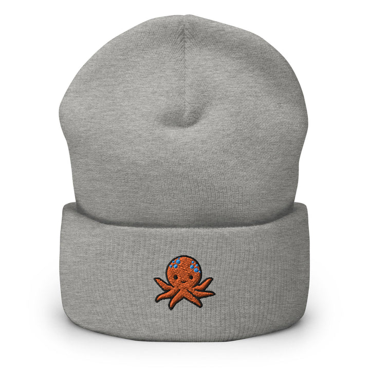 a gray beanie with an octopus on it