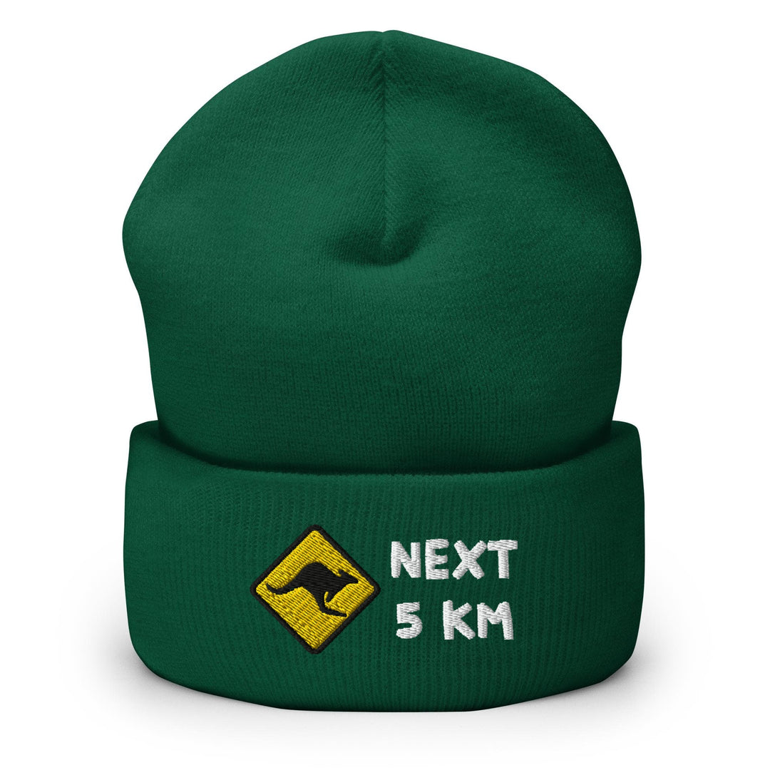 a green hat with a kangaroo on it
