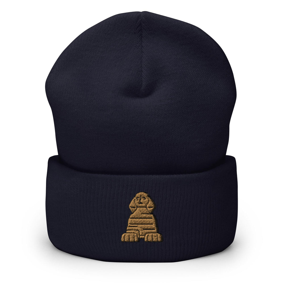 a blue beanie with a gold dog on it