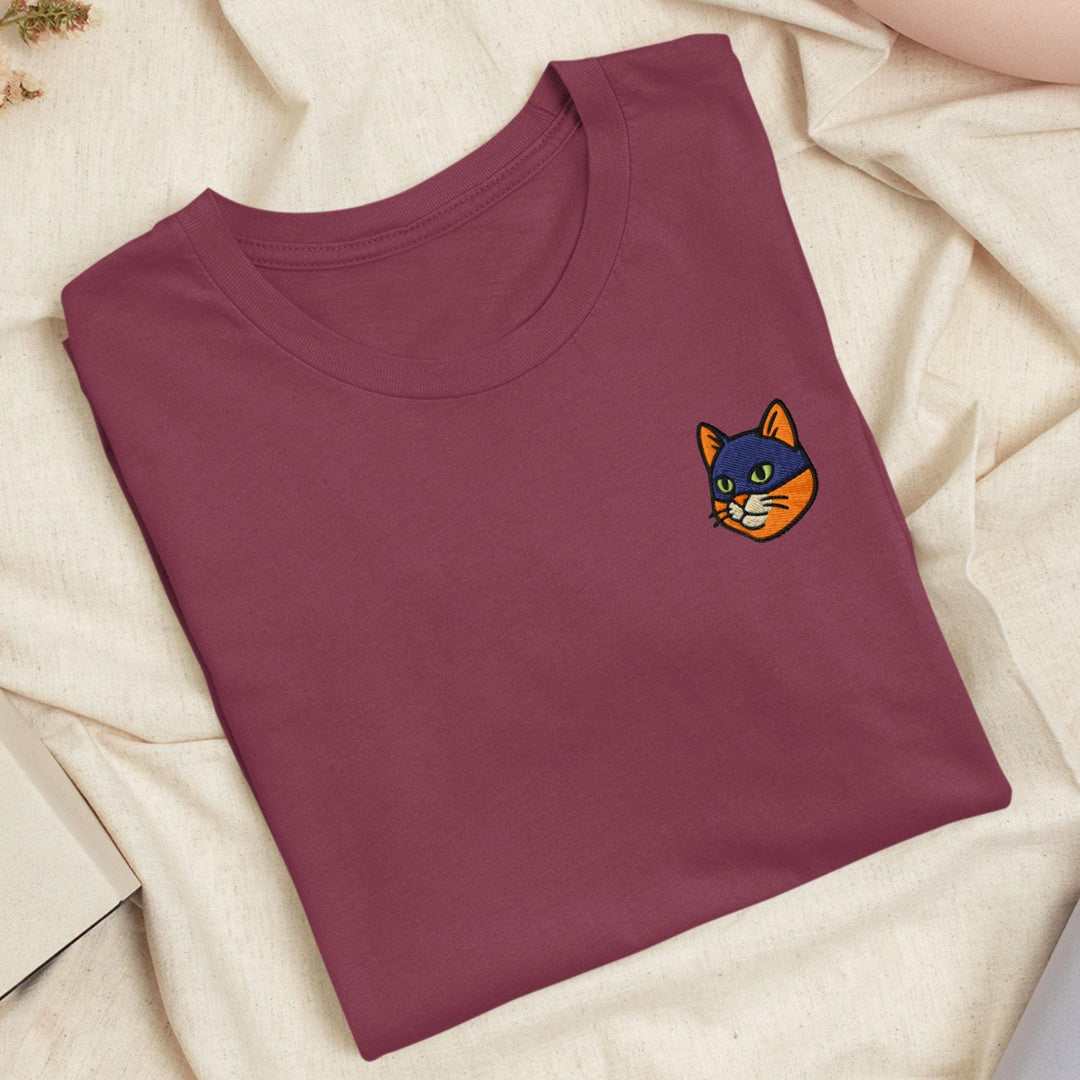 a t - shirt with a picture of a cat on it