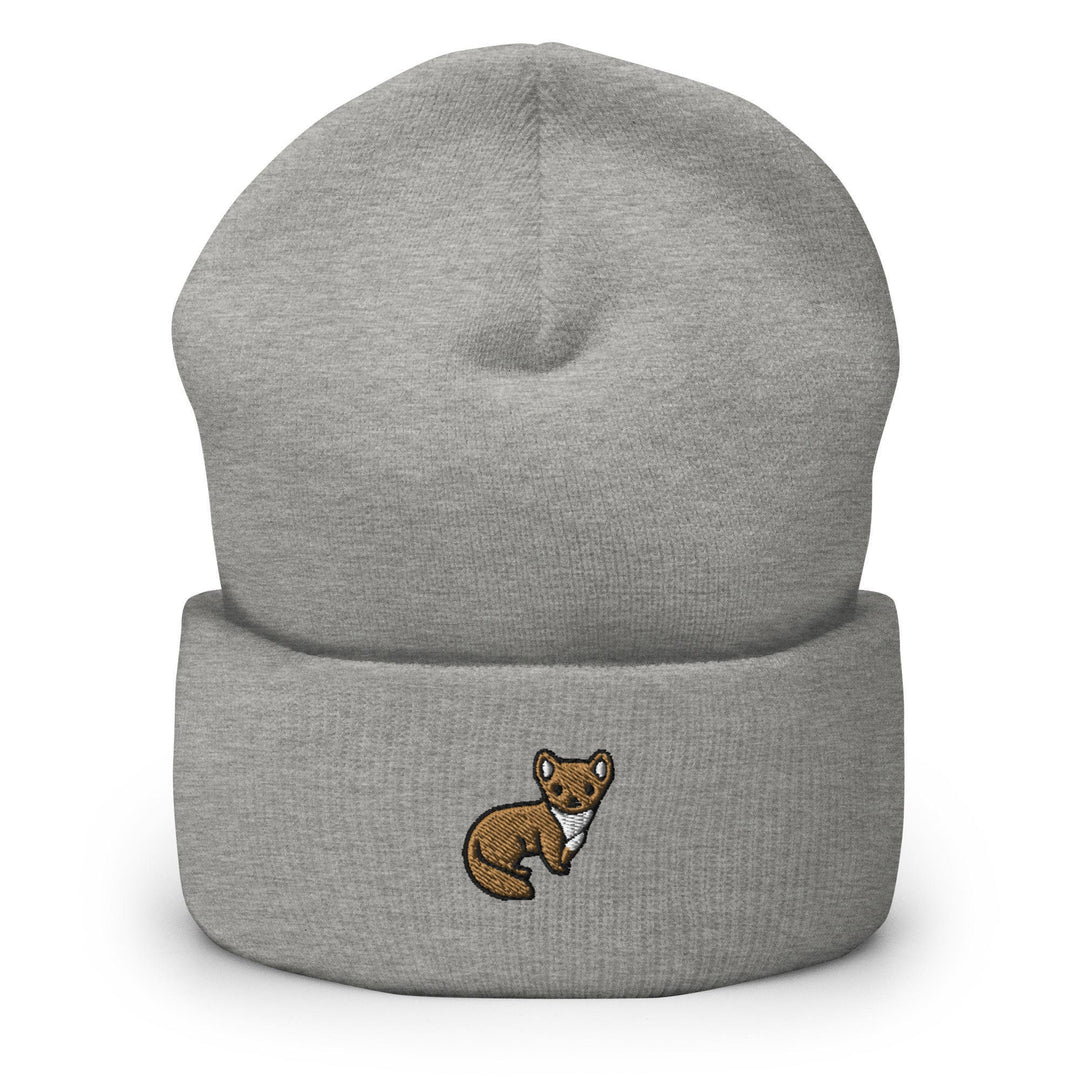 a grey beanie with a brown bear on it