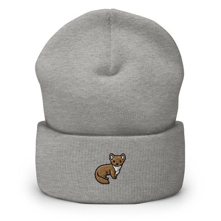 a grey beanie with a brown bear on it