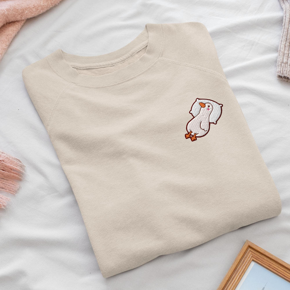 a t - shirt with a picture of a bird on it