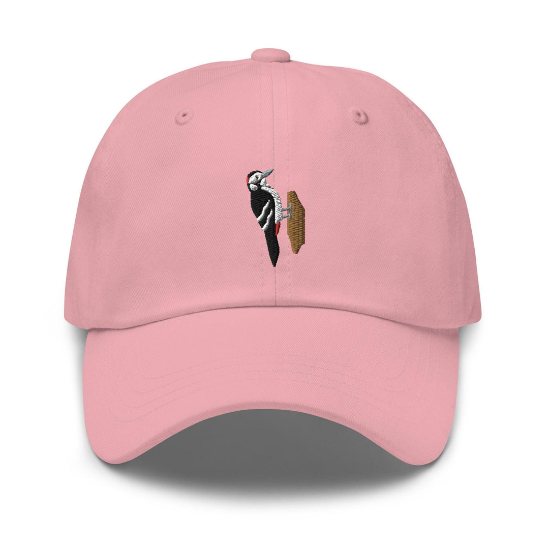 a pink hat with a picture of a bird on it