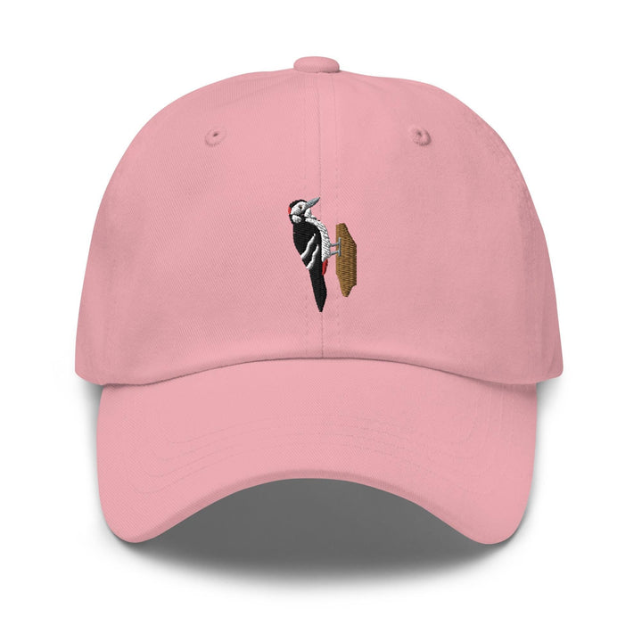 a pink hat with a picture of a bird on it