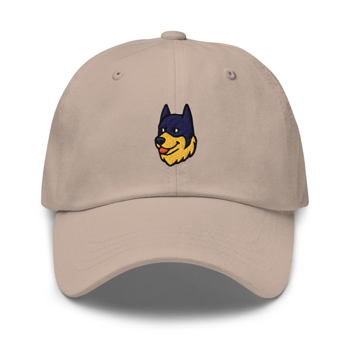 a tan hat with a cartoon dog on it