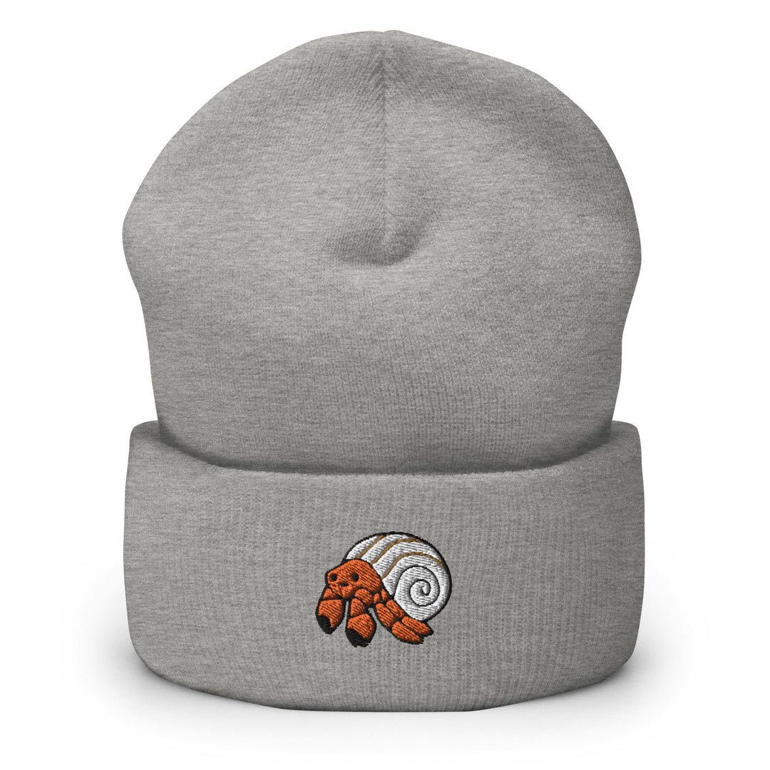 a gray beanie with an orange and white snail on it