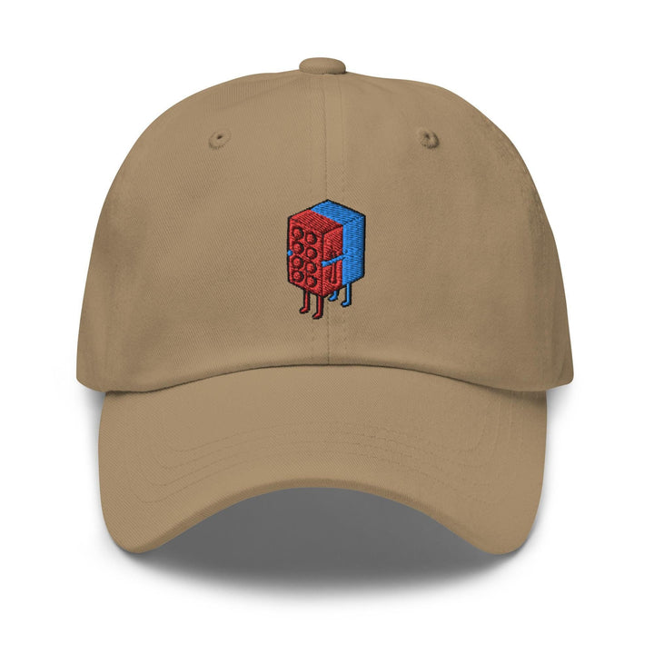 a tan hat with a red cube on it