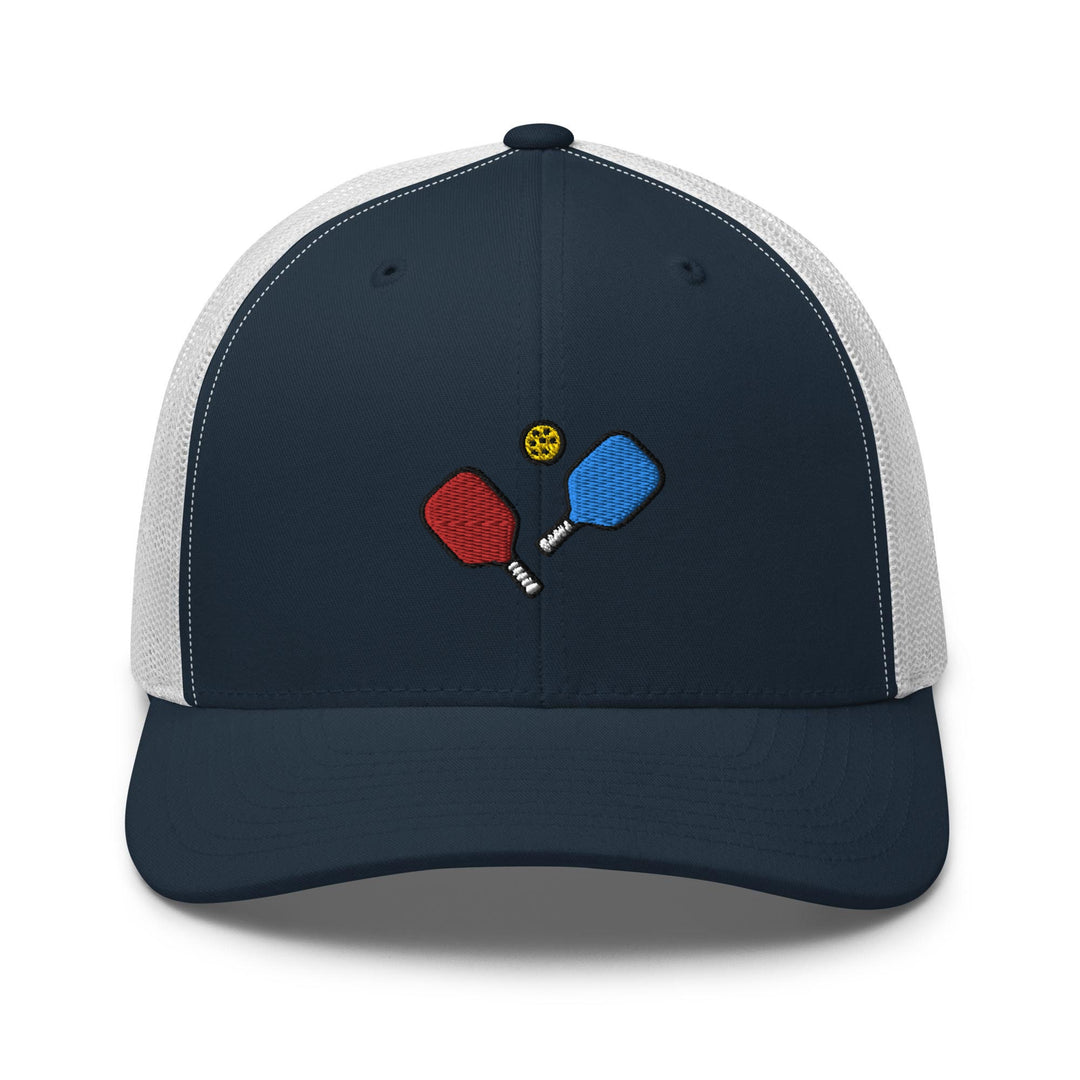 a blue hat with two ping pong paddles on it