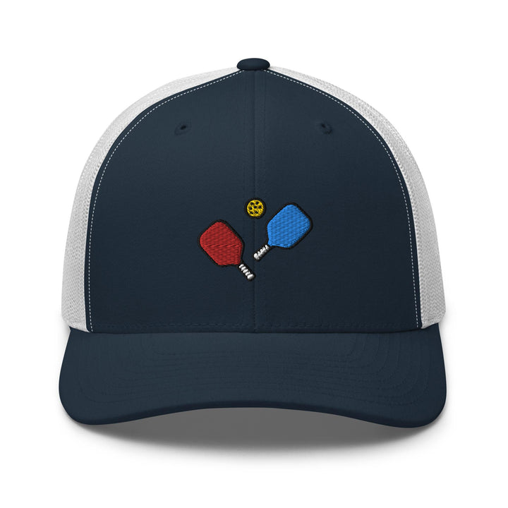 a blue hat with two ping pong paddles on it