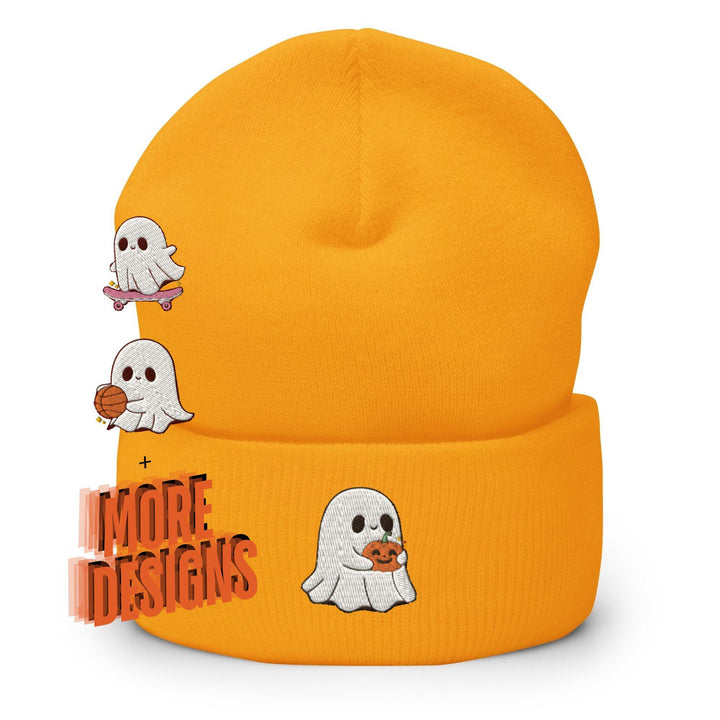 a yellow beanie hat with ghost stickers on it