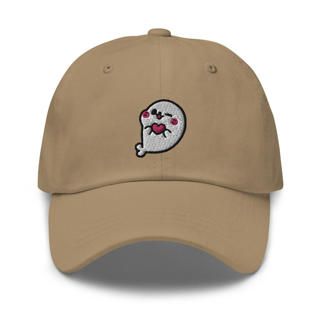 a tan hat with a cartoon character on it