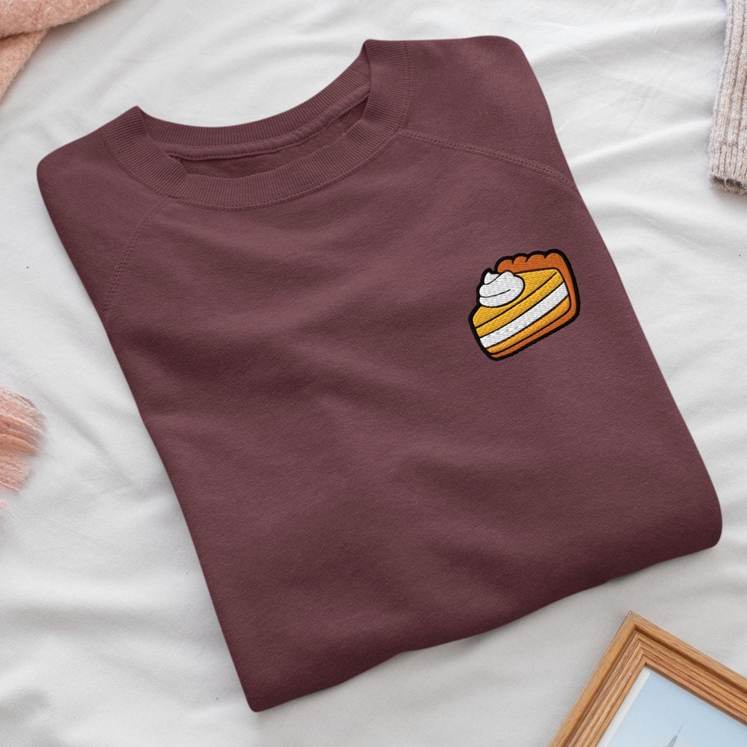 a t - shirt with a picture of a piece of cake on it