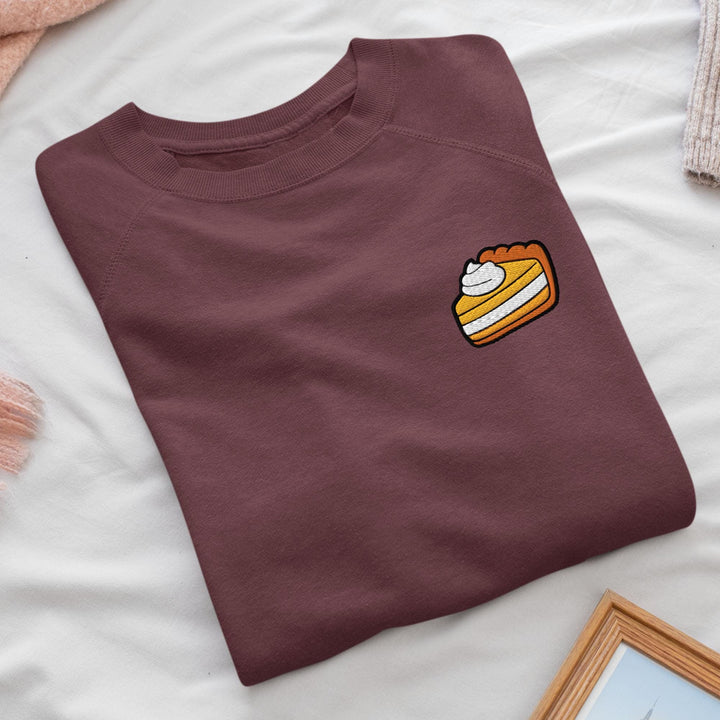 a t - shirt with a picture of a piece of cake on it