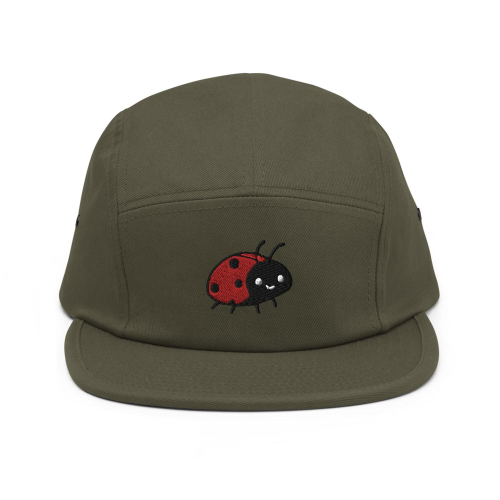 a green hat with a ladybug embroidered on it