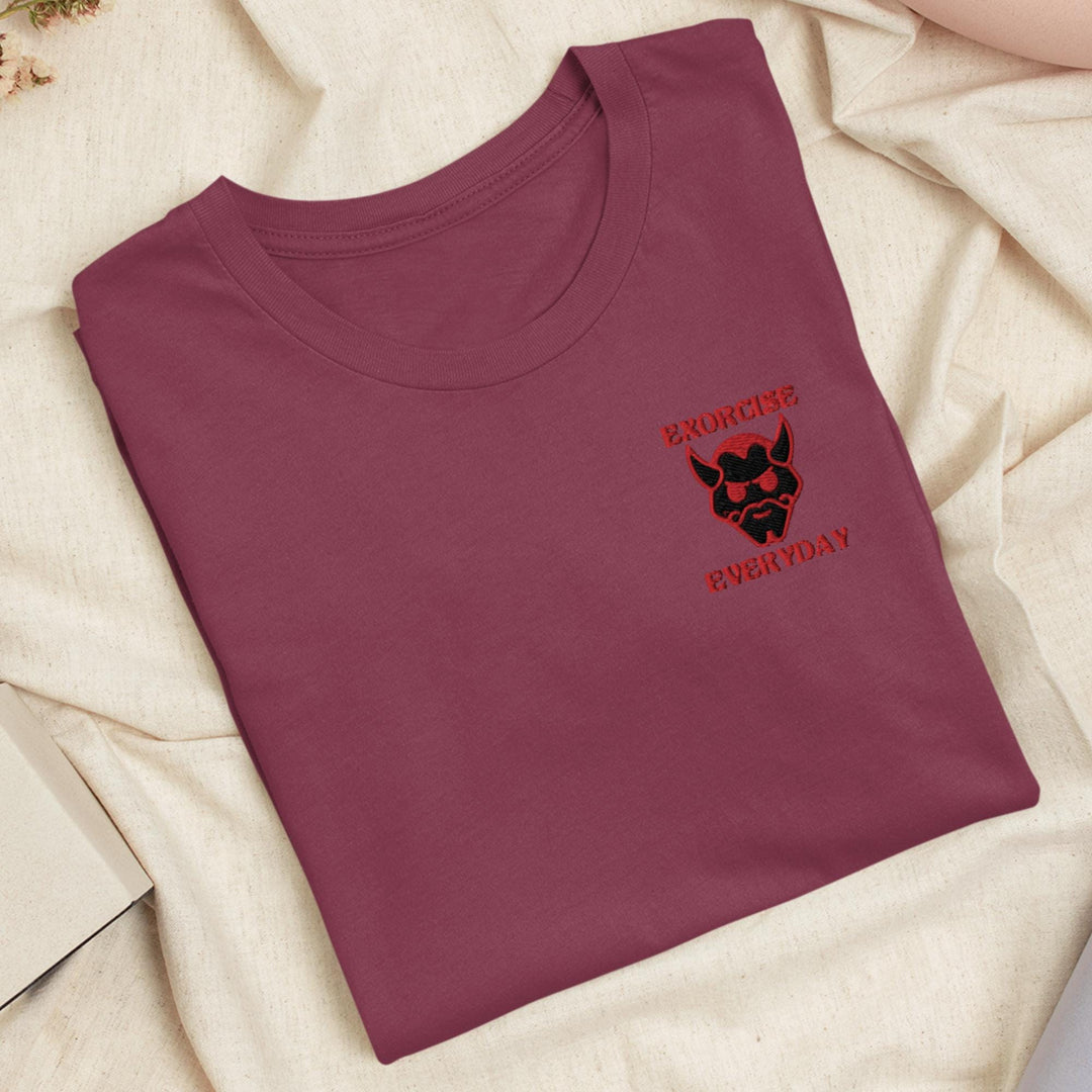 a red t - shirt with a skull on it