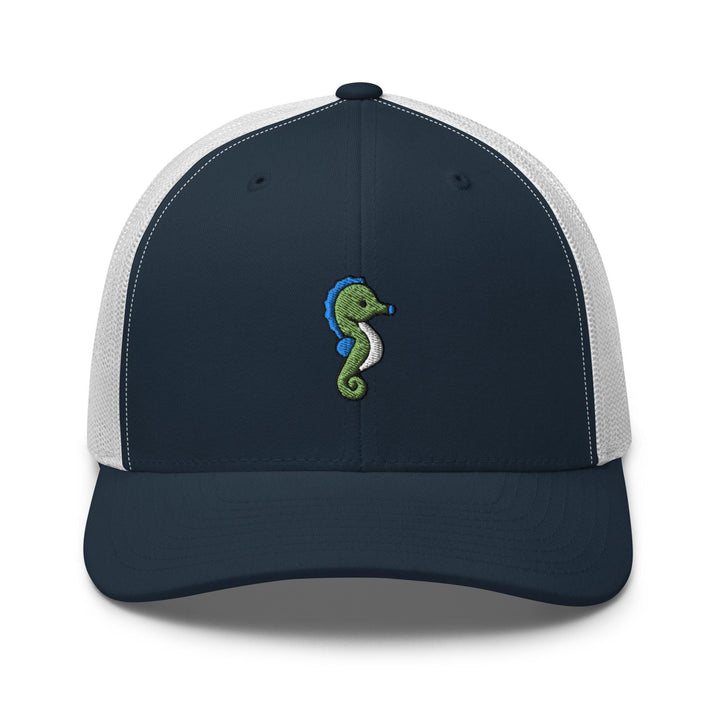 a blue and white trucker hat with a green seahorse embroidered on the front