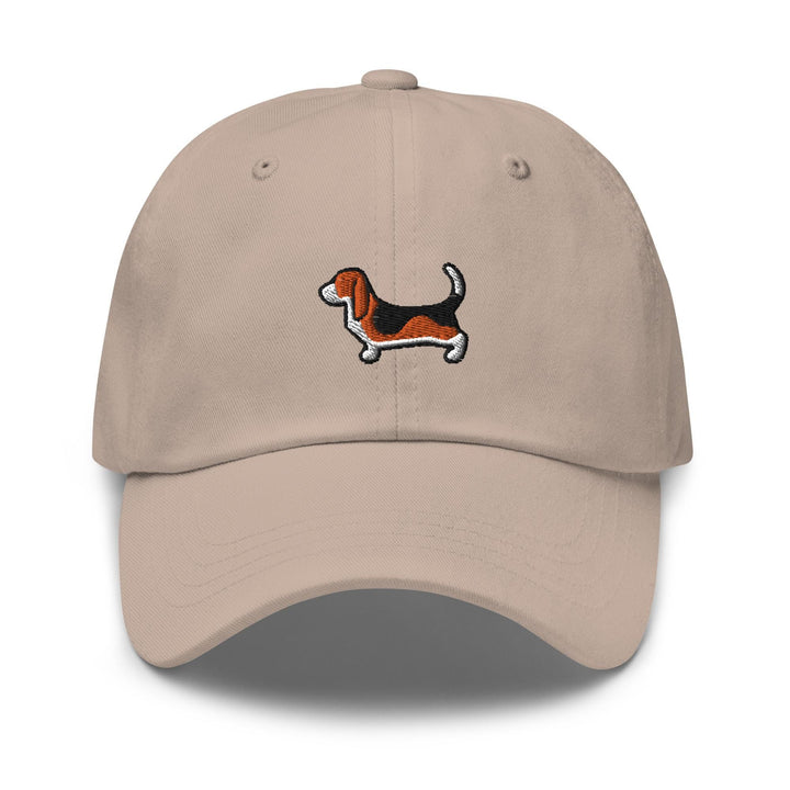 a tan hat with a dog embroidered on it
