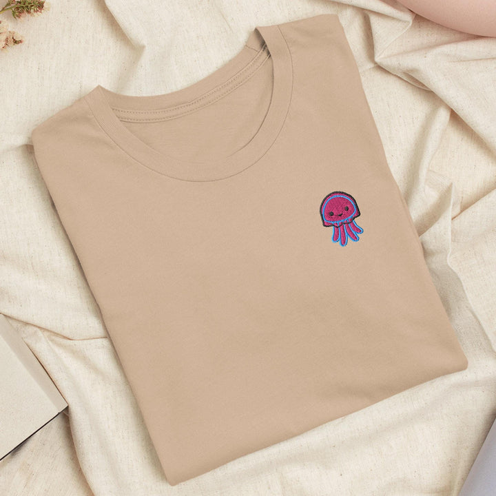 a t - shirt with a jellyfish embroidered on it