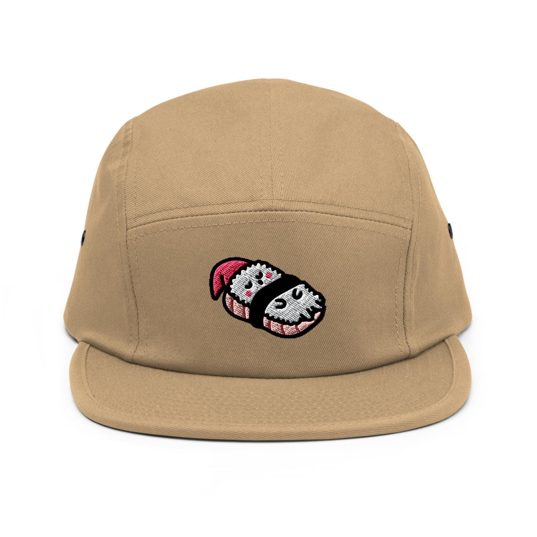 a tan hat with a cartoon character on it